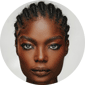 a black woman looking into the camera