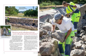 a magazine article about a restored dry stone wall